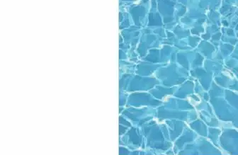 White area beside blue swimming pool water with rippling light reflections