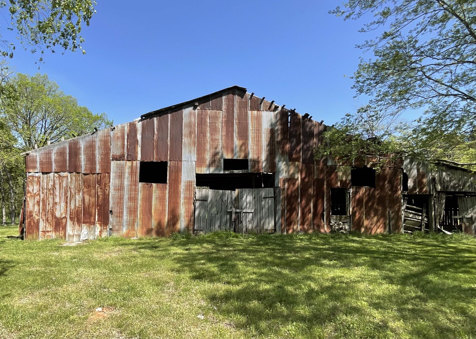 Mural Painted Old Barns in College Grove Front Before - Exterior Murals