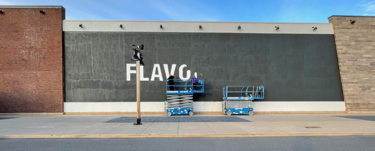A large wall with the word flavg painted on it.