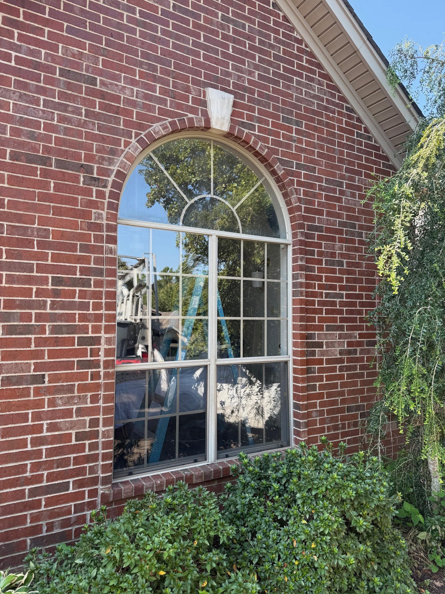 old window on a brick house