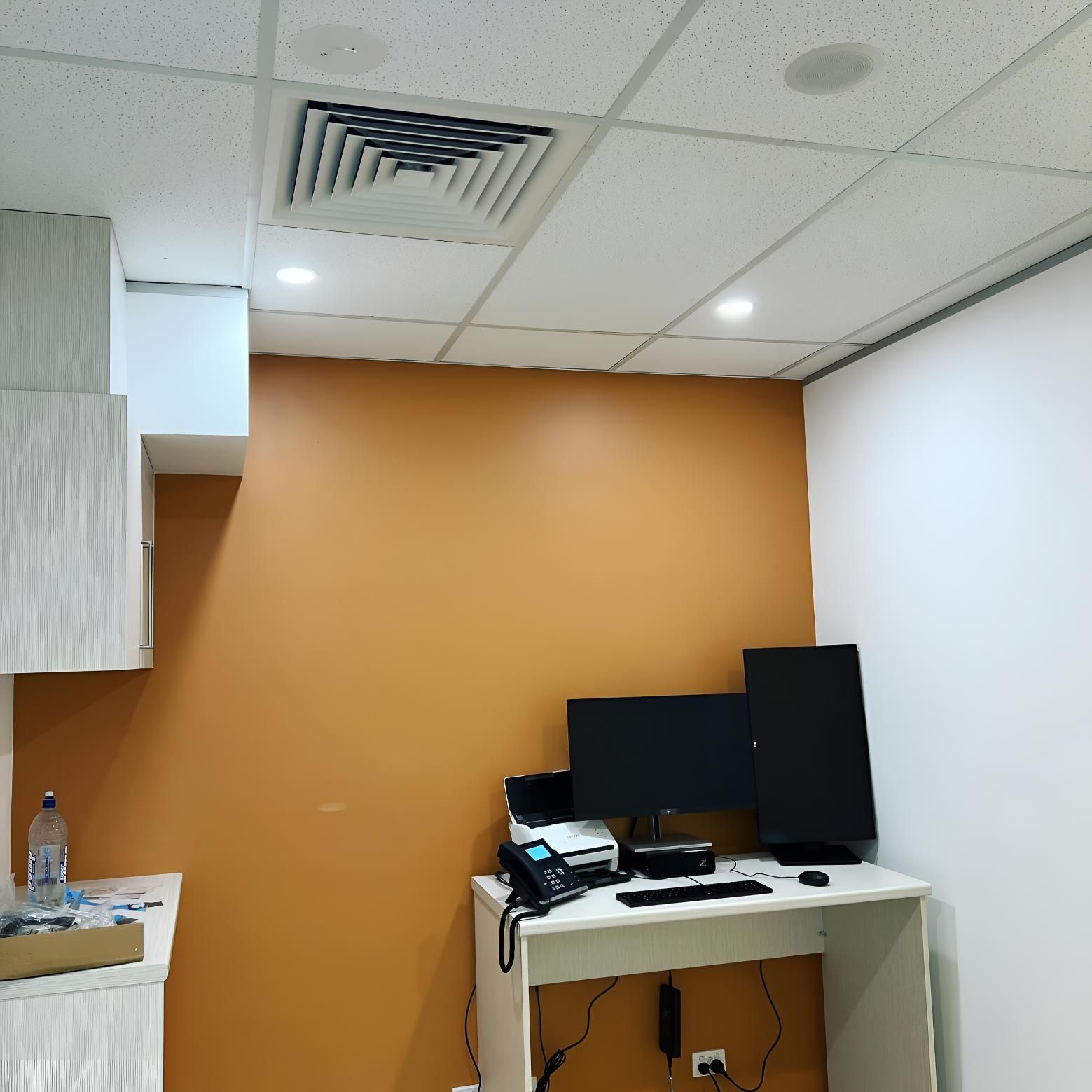 Room With an Orange Wall and Ducted Air Conditioning — Kiama Air Conditioning in Albion Park Rail, NSW