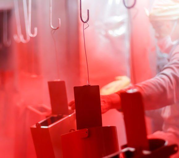 Powder Coating of Metal Parts in Factory — Powder coating service in Singleton, NSW