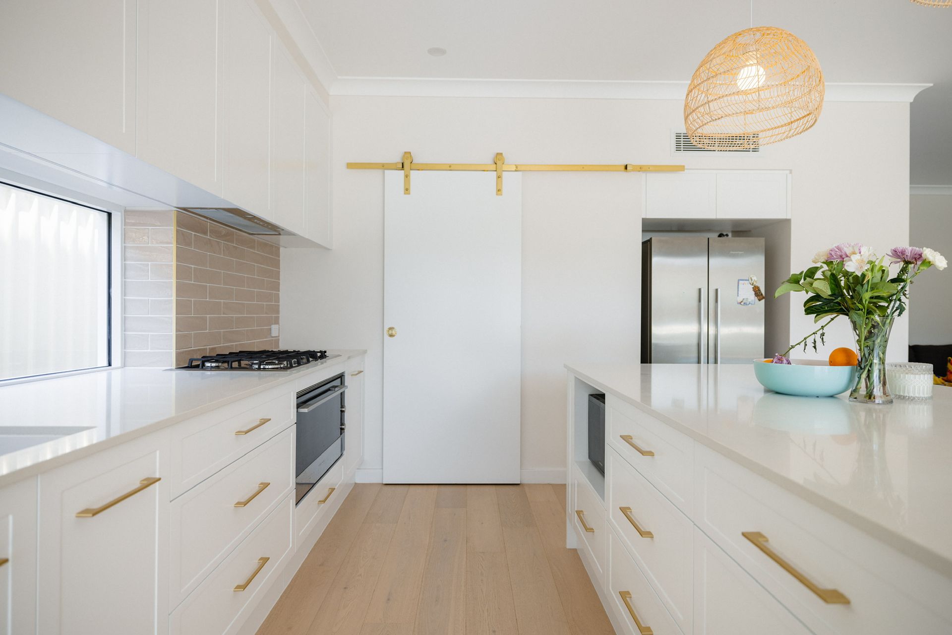 A Large White House with A Lot of Windows and A Driveway — Blue Horizon Projects in Bateau Bay, NSW