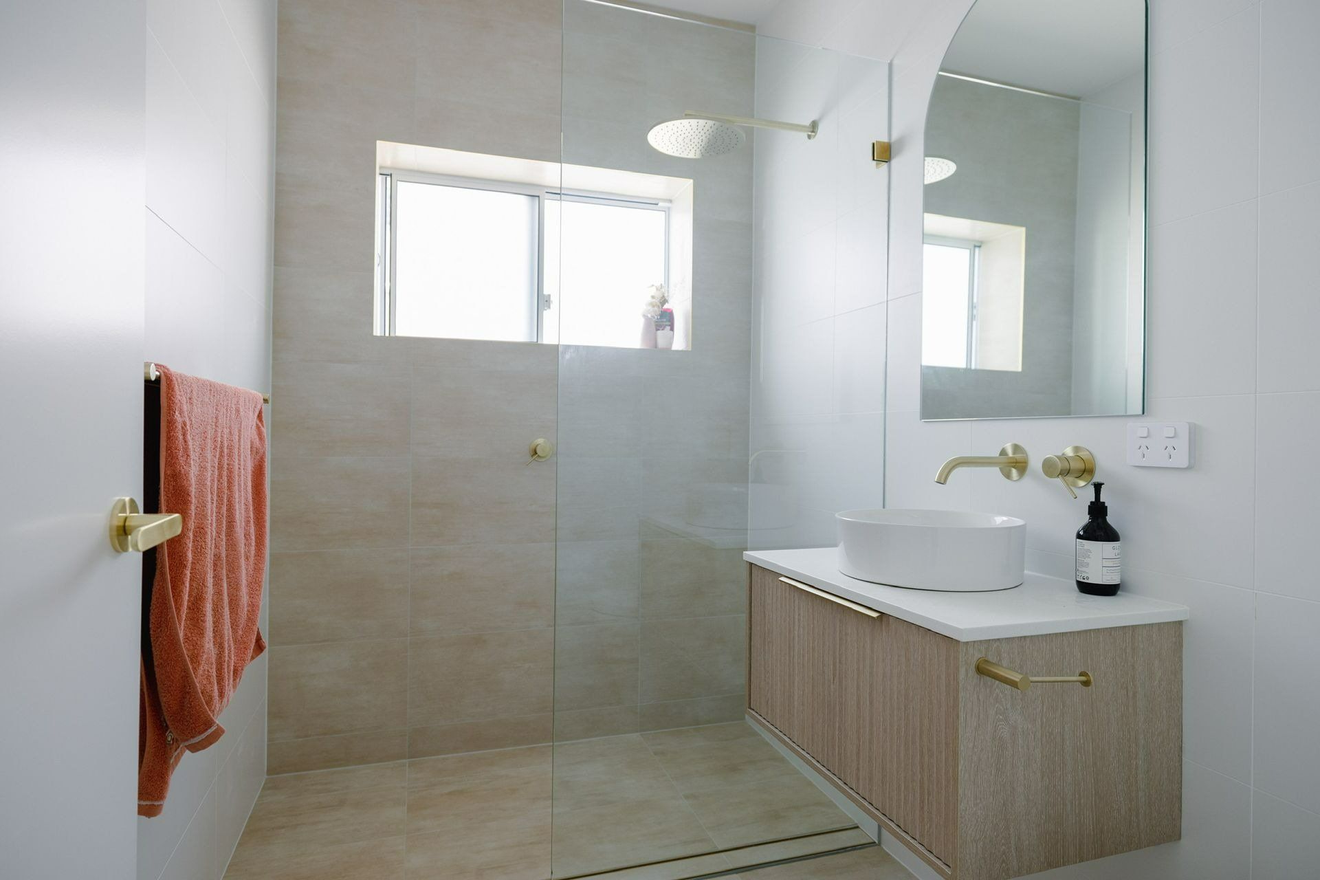 A Bathroom with A Sink , Mirror and Walk in Shower — Blue Horizon Projects in Long Jetty, NSW