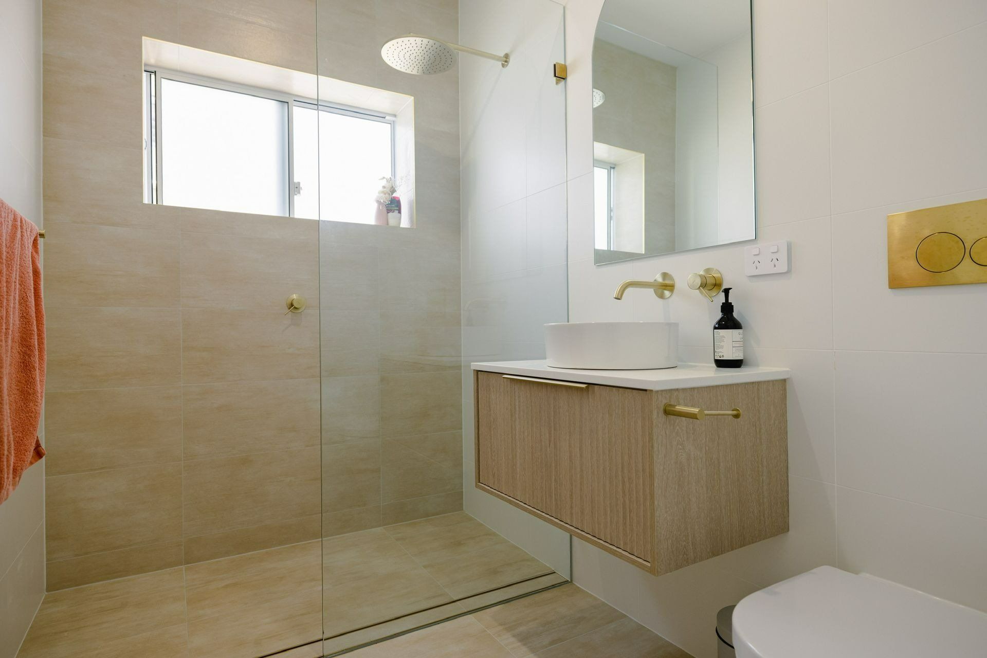 A Bathroom with A Sink, Toilet and Walk in Shower — Blue Horizon Projects in Forresters Beach, NSW