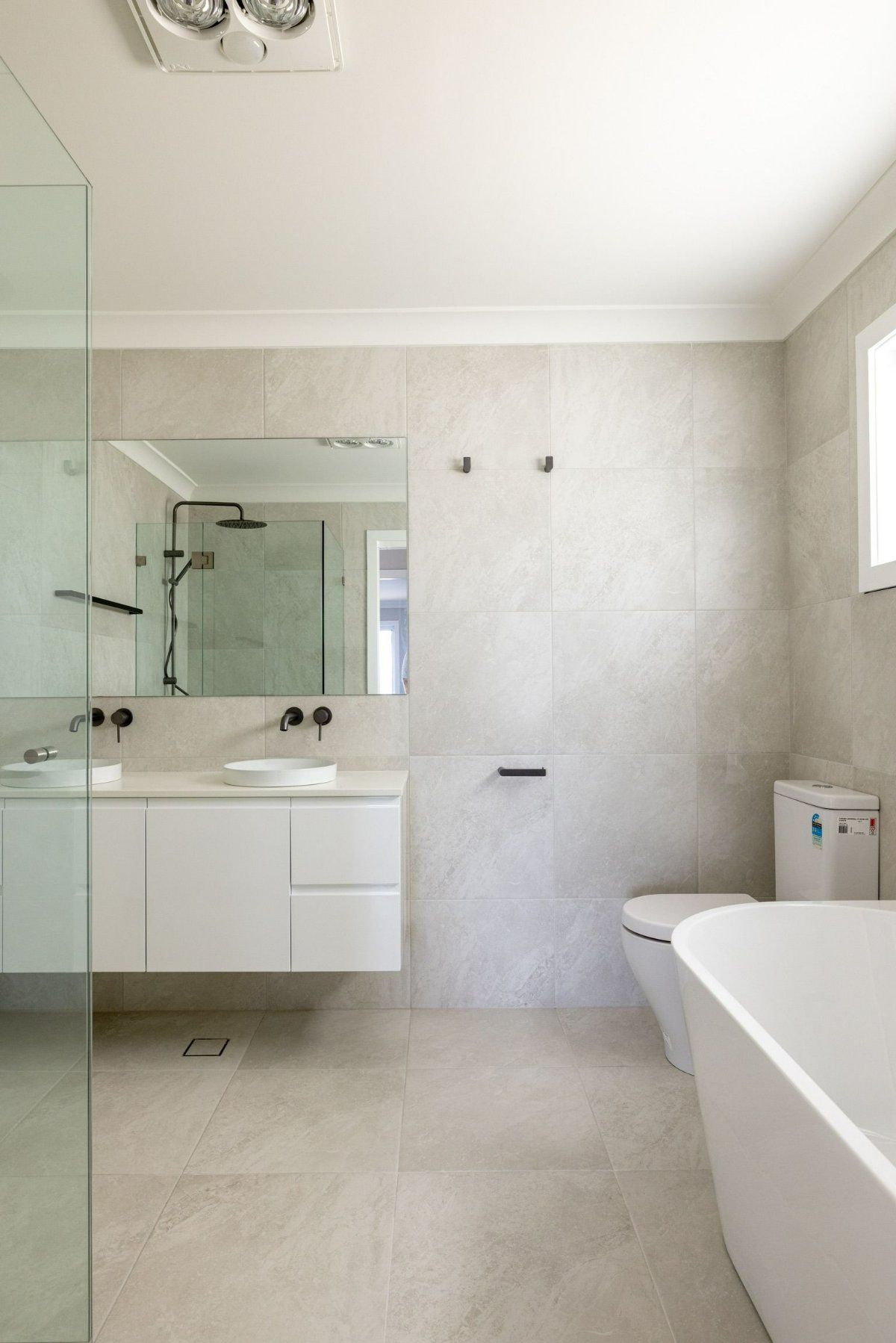 A Bathroom with A Sink, Toilet, and Bathtub — Blue Horizon Projects in Terrigal, NSW