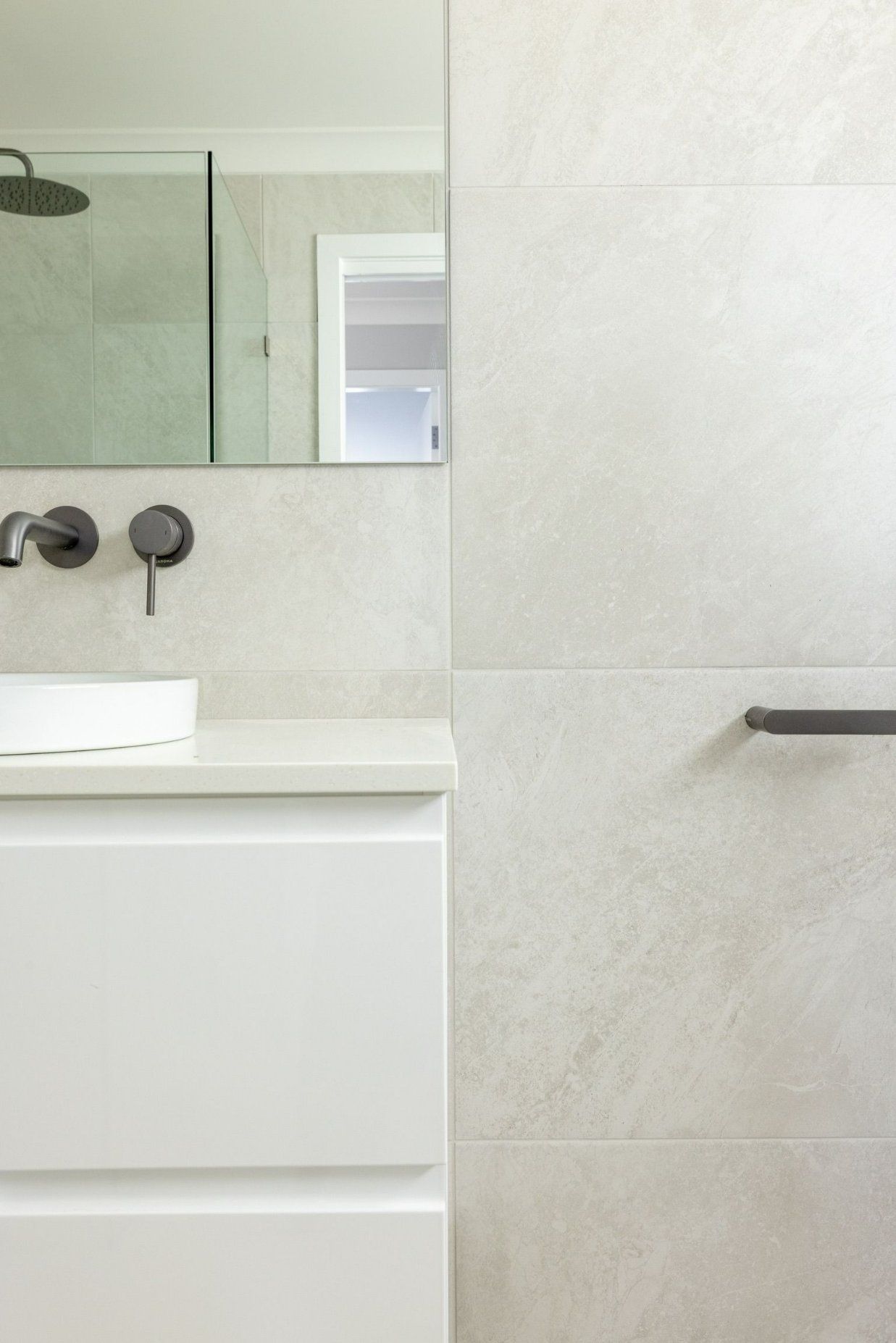 A Bathroom with A Sink, Mirror and Shower — Blue Horizon Projects in Terrigal, NSW