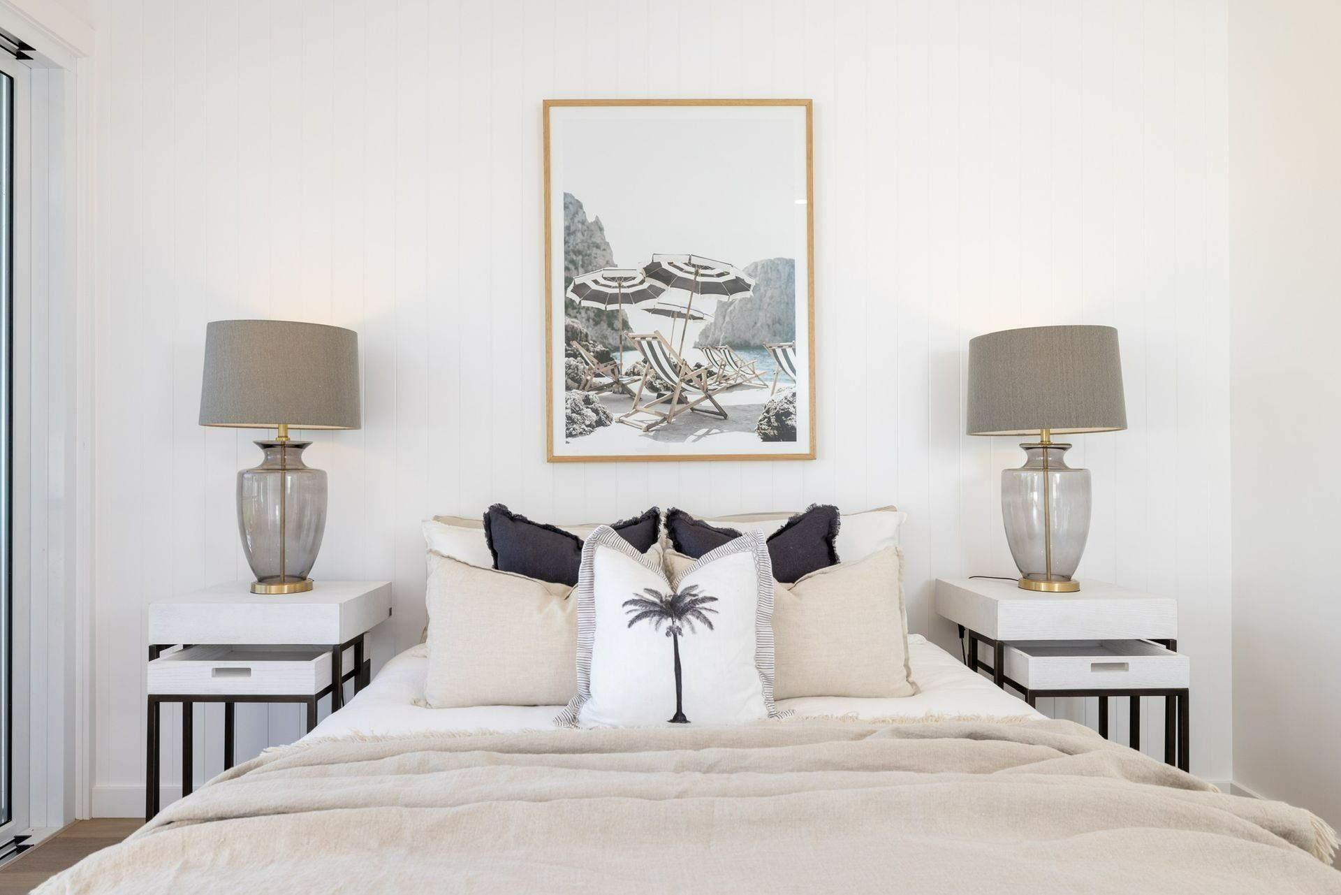 A Bedroom with A Bed, Nightstands, Lamps and A Picture on The Wall Above the Bed — Blue Horizon Projects in Wyong, NSW