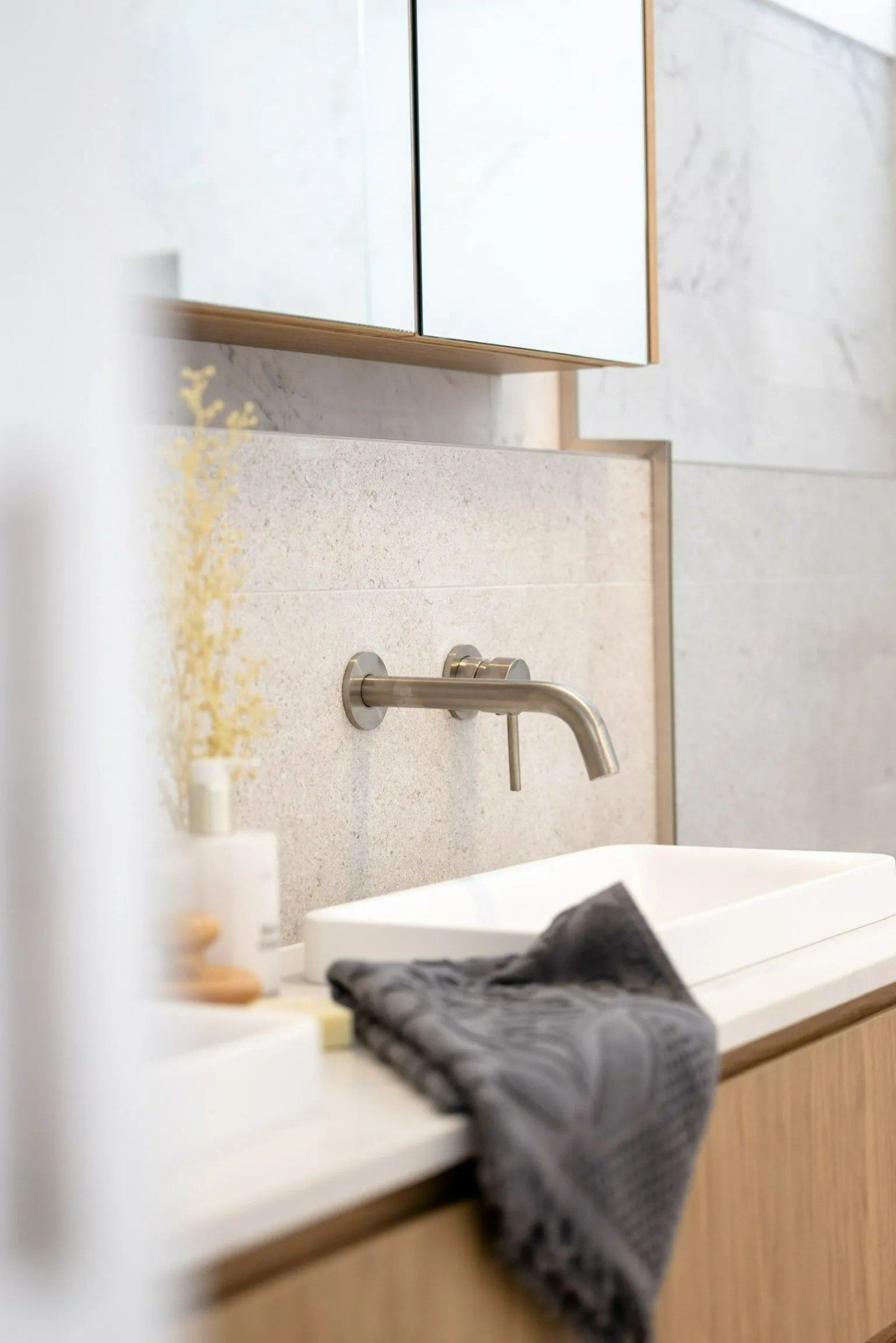 A Bathroom with A Sink and A Towel on The Counter — Blue Horizon Projects in Blue Bay, NSW