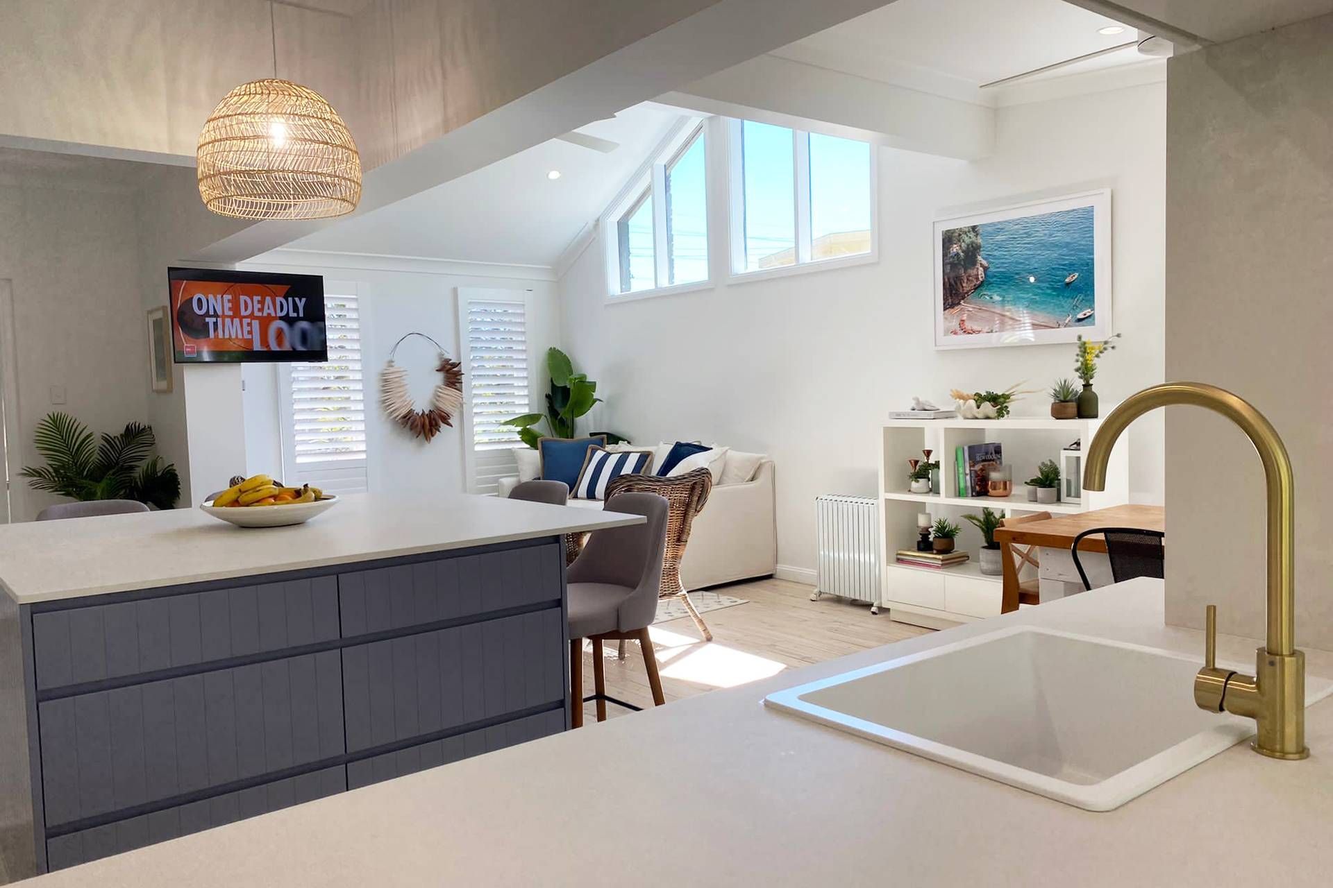 Bright Modern Living Space Featuring a Kitchen Island — Blue Horizon Projects in Bateau Bay, NSW