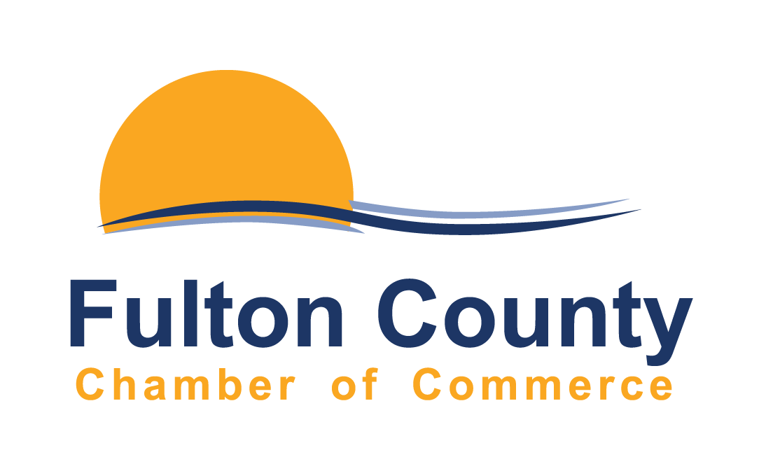 Logo for Fulton County Chamber of Commerce featuring a yellow semi-circle over blue swooshes above the organization name.