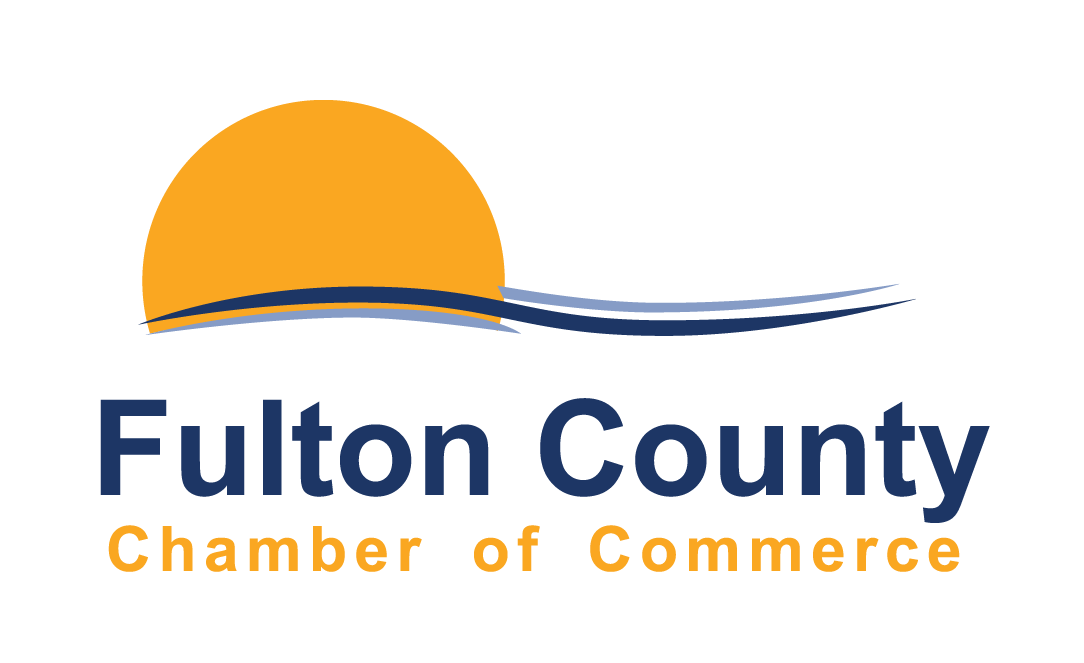 The Fulton County Chamber of Commerce logo, featuring an orange sun above a blue wavy line and dark blue text.