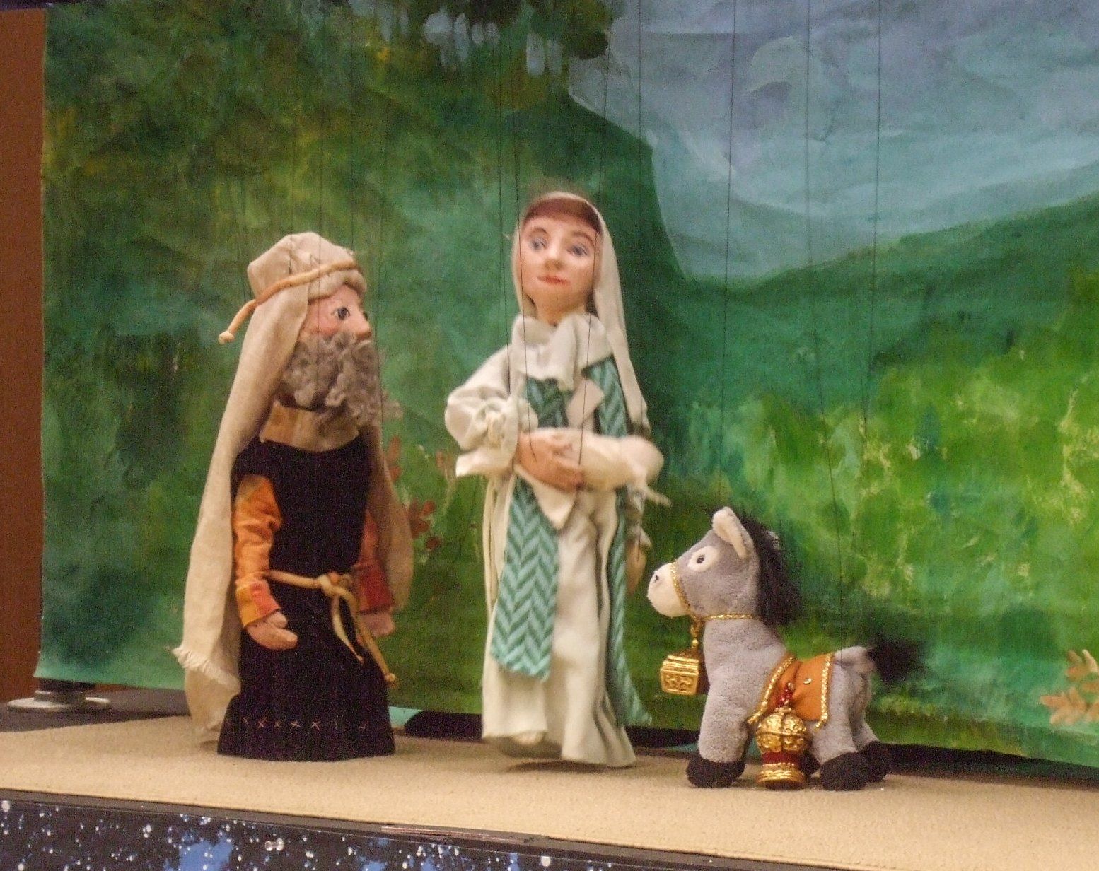Mary and Joseph with donkey marionettes