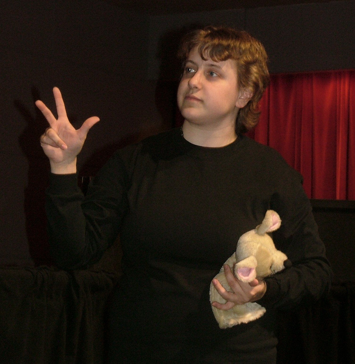 Miss Cassie demonstrates common finger technique for using simple hand puppet