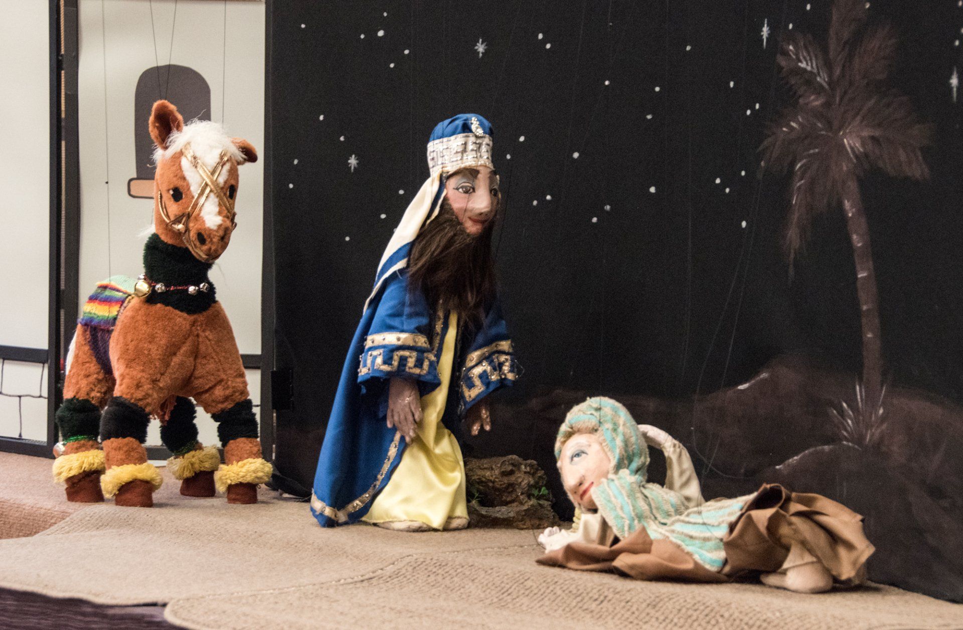 Marionette Artaban character assists the sick man