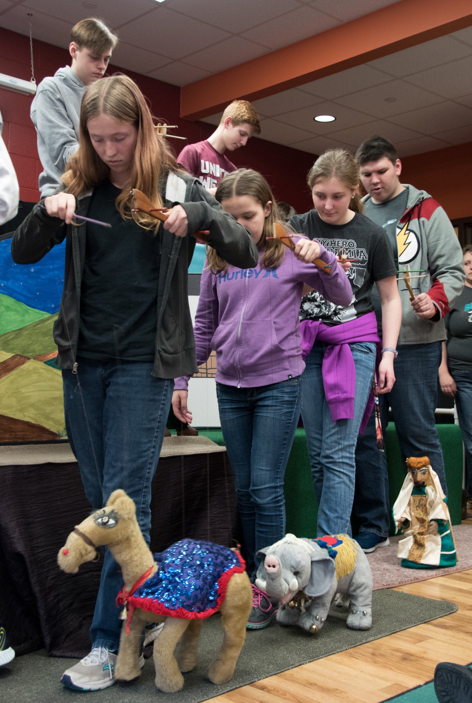 FVL  marionette team members show puppets to the audience