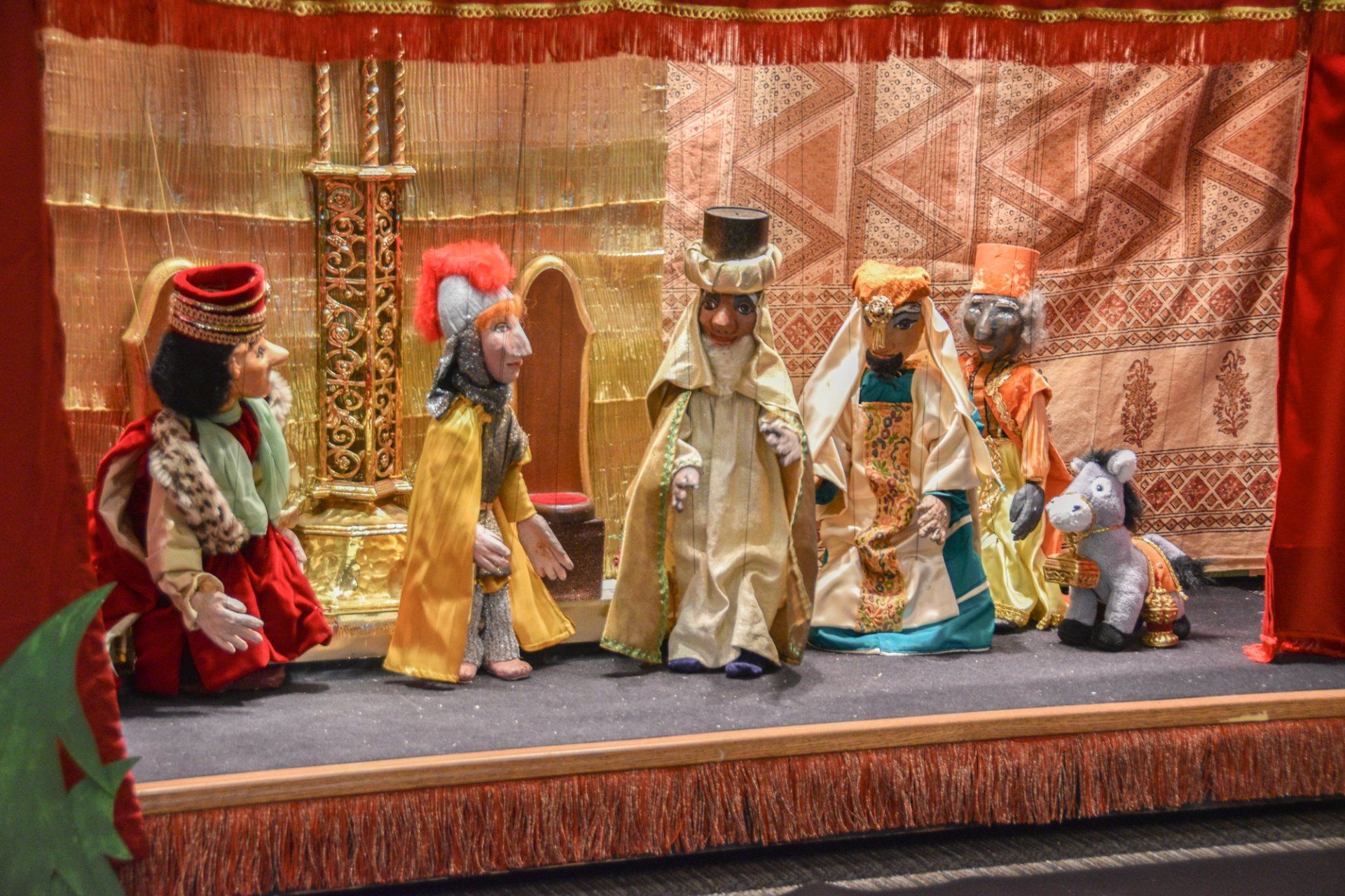King Herod, flanked by a Roman soldier, meets the Wisemen