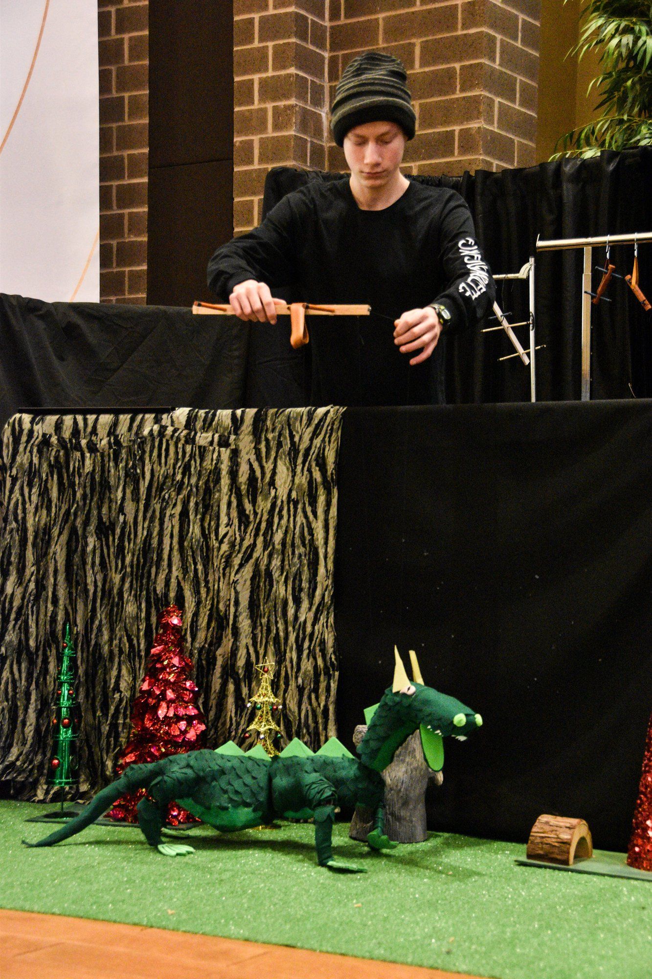 Our puppeteer brings the Dragon puppet to life for the audience