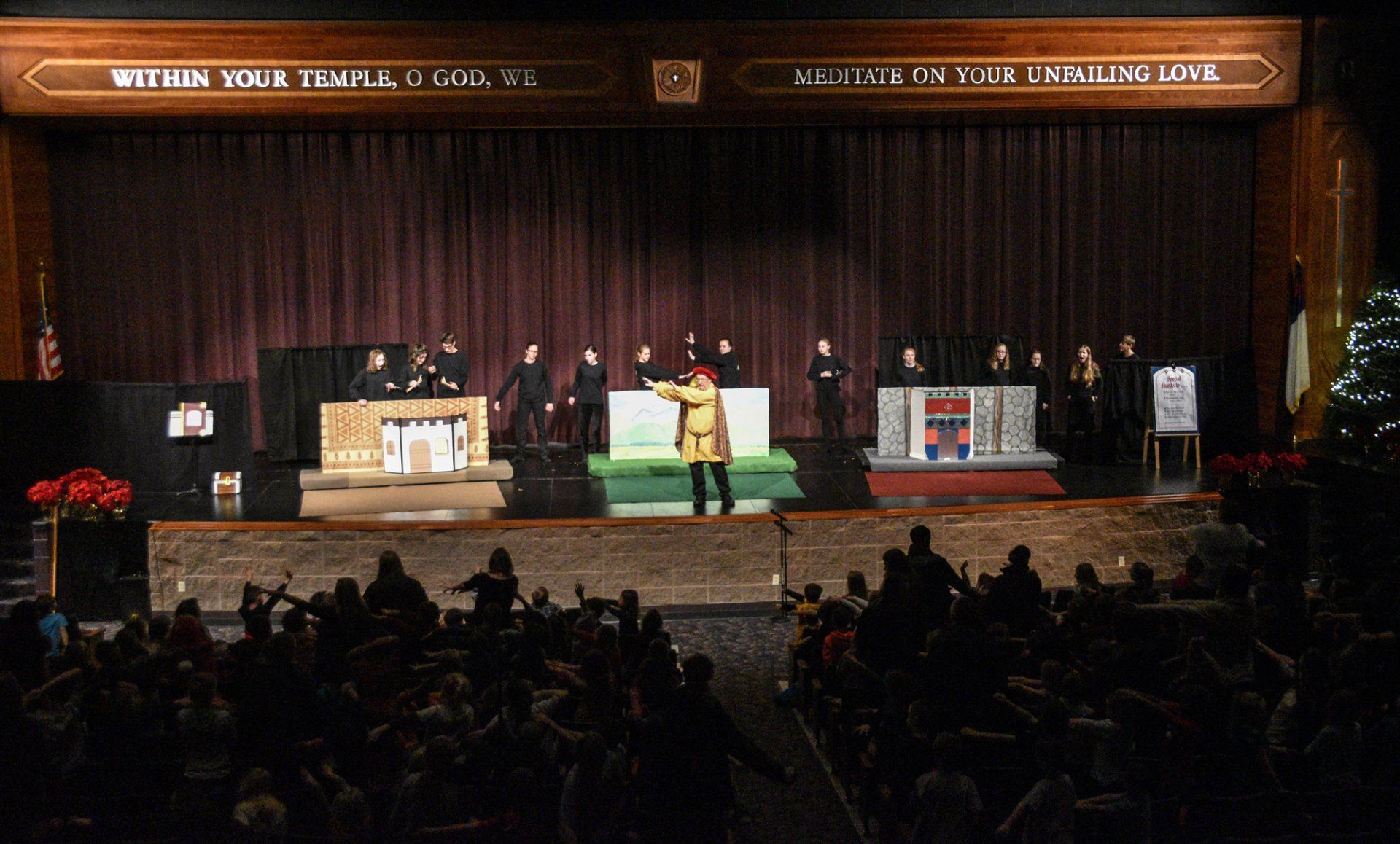 Mr. Dave leading onstage audience participation at an FFM Christmas show in the FVL auditorium