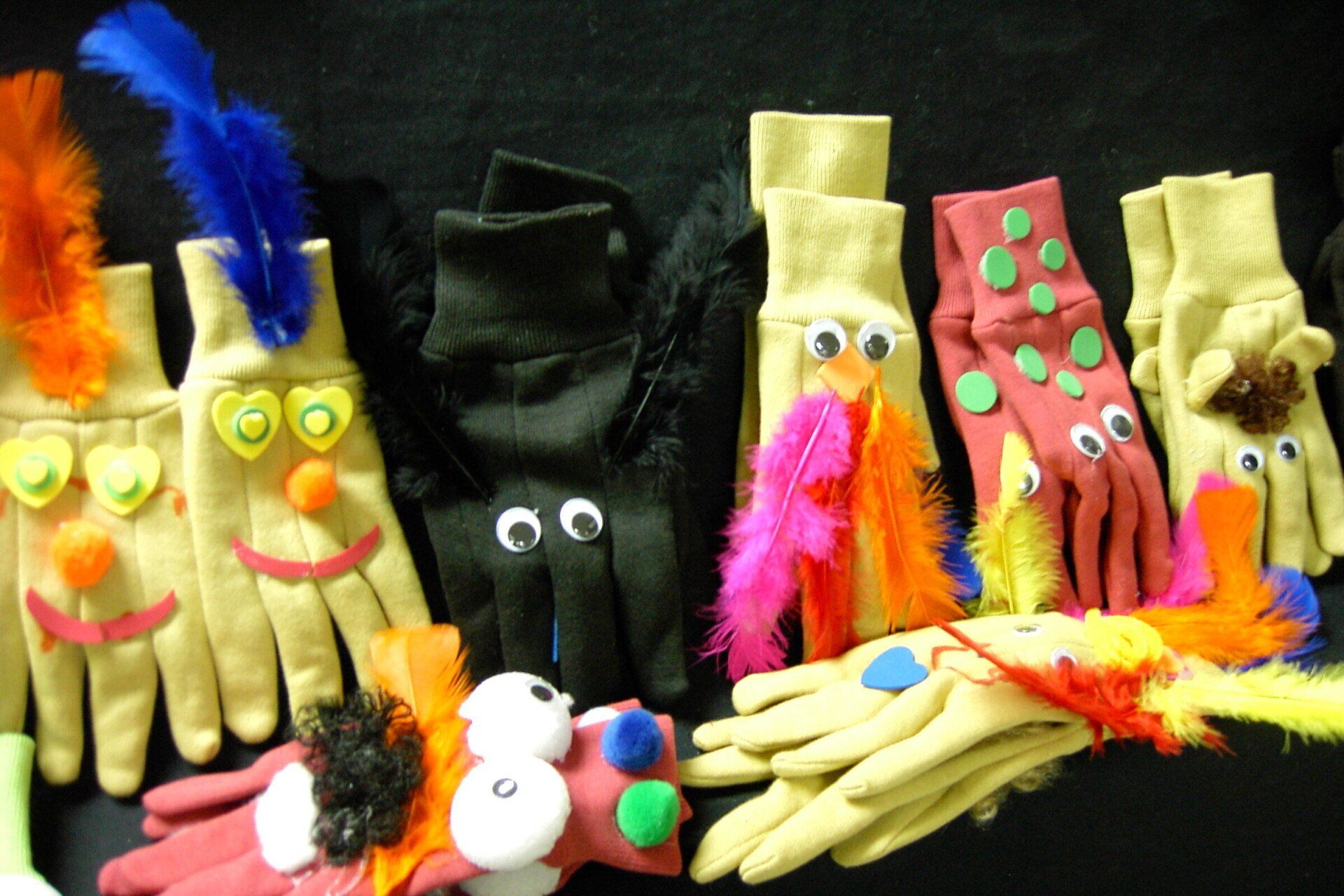 collection of colorful glove puppets created by elementary school students