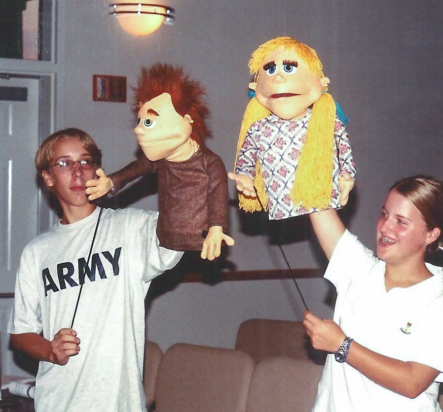 Workshop participants demonstrate their rod-arm technique with moving mount hand puppets