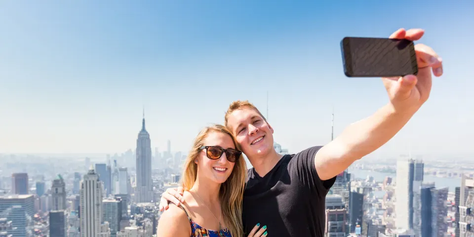 Couple Taking a Selfie — Brooklyn, NY — Brooklyn Radio Dispatcher