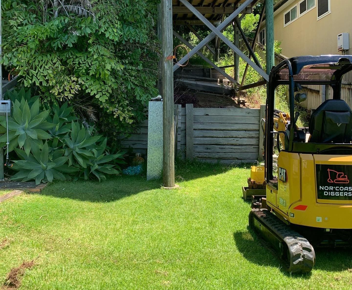 A Large Hole in the Ground With a Ladder in It — Norcoast Diggers in Ballina, NSW