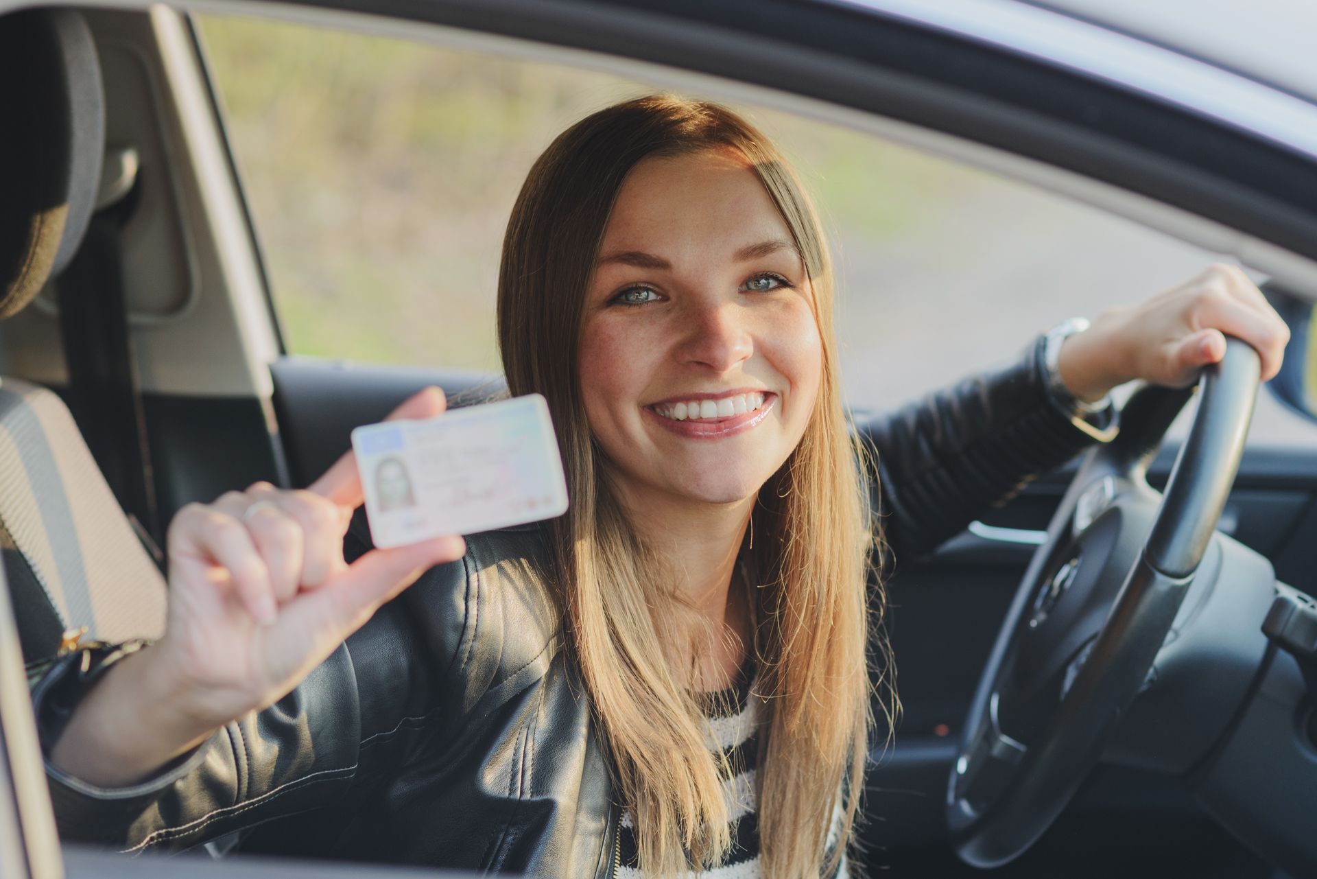TEEN HOLDING UP LICENSE