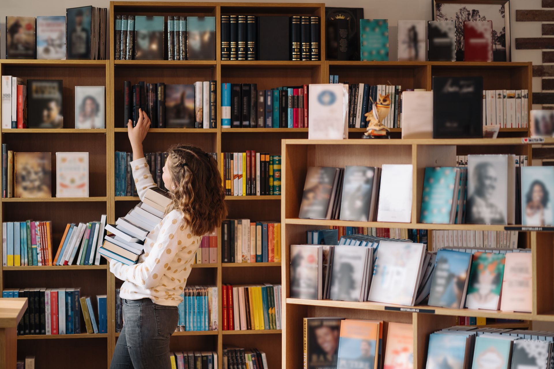 image of woman shelving books