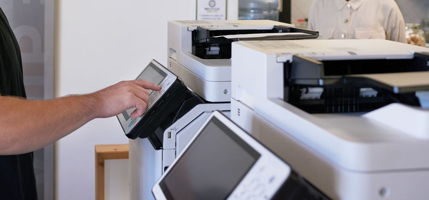 closeup of two commercial printers