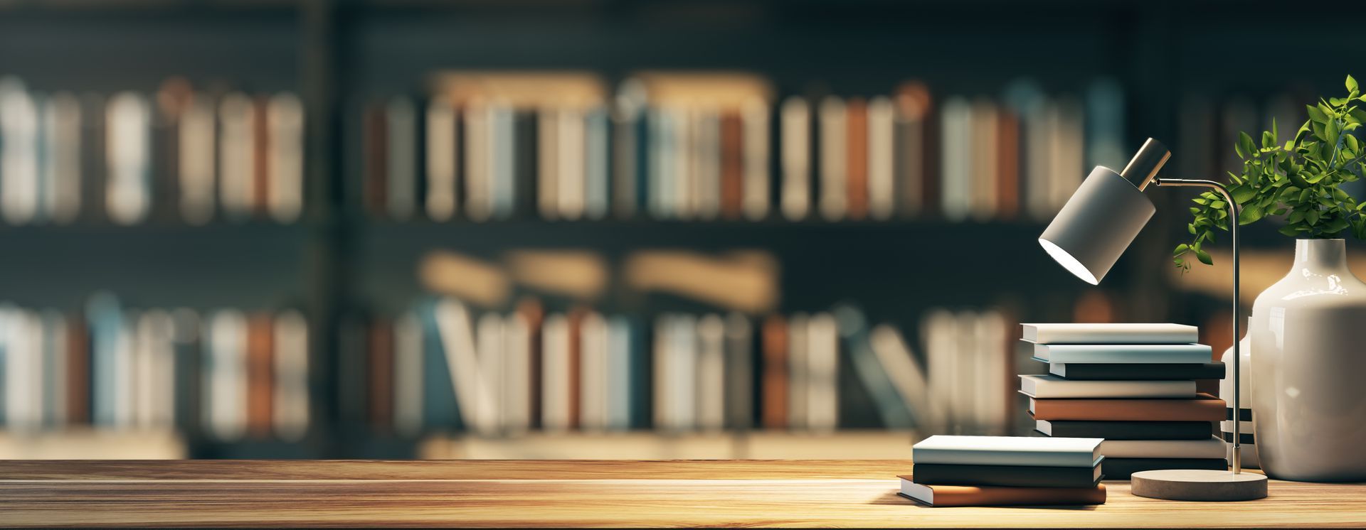 image of desk with book shelves in background