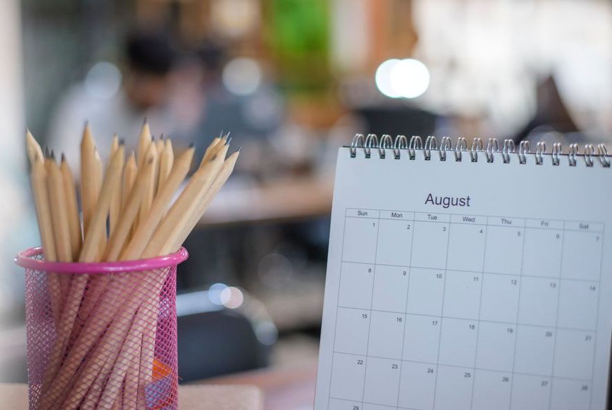 photo of pencil up and calendar