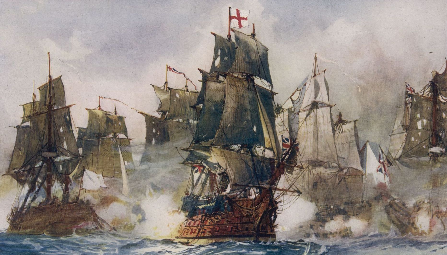 a group of ships on the ocean, the lead one flying the flag of England.