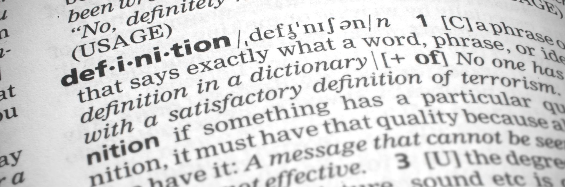 A dictionary, open to the definition of the word definition.