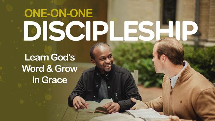 Two men discussing discipleship over an open Bible, with “ONE-ON-ONE DISCIPLESHIP” text on a gold background