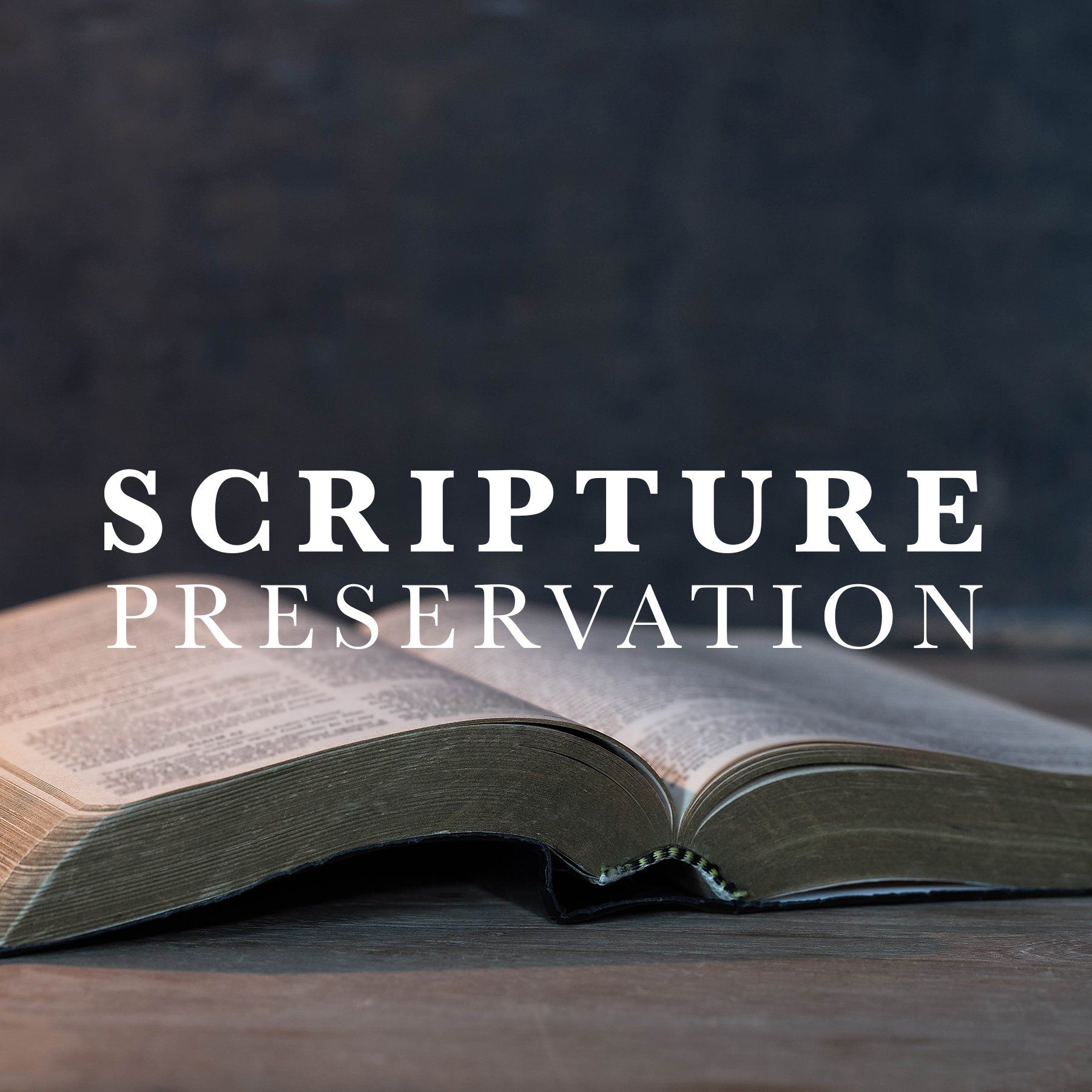 Open Bible on table with overlaid text “Scripture Preservation”