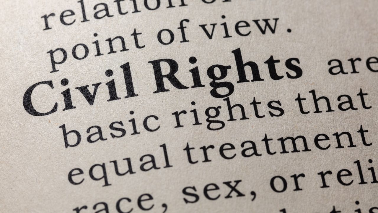 Close-up of a book page with bold text “Civil Rights” and surrounding black serif text on white paper