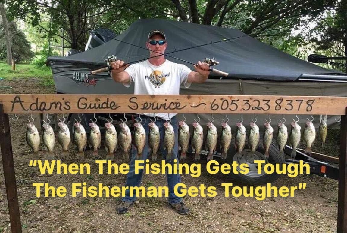 Man holding fishing rods, displaying a row of caught fish. Text: 