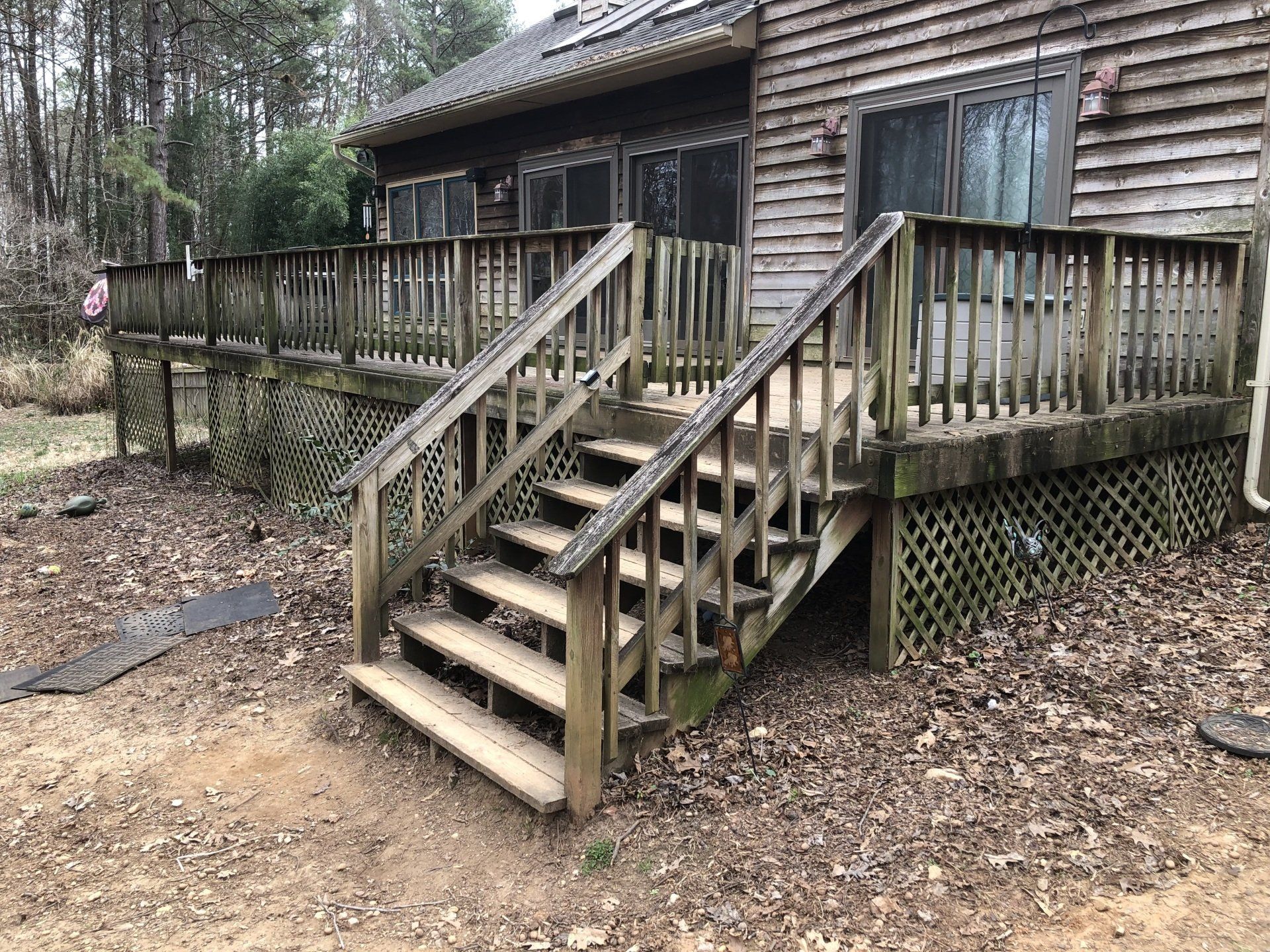 dirty old wood balcony, house and windows