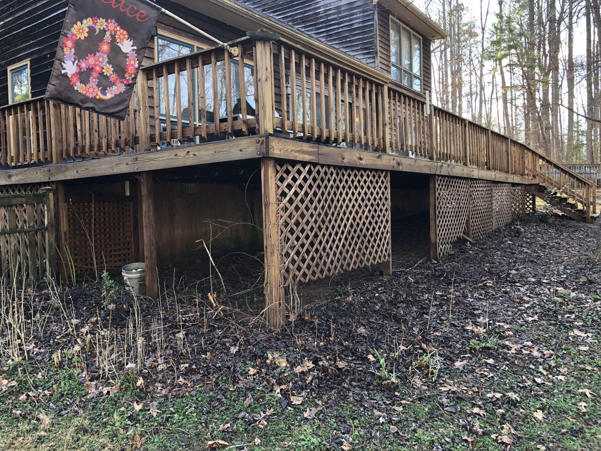 cleaned new look old wood deck, house and windows