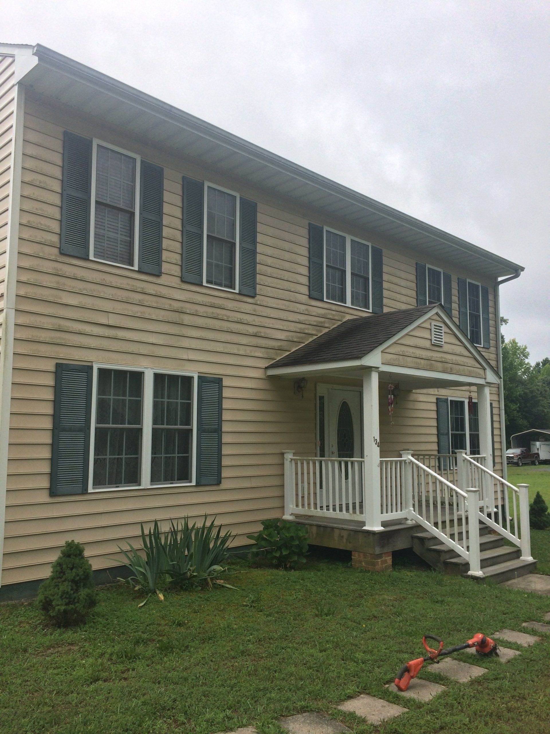 dirty sand color exterior  house