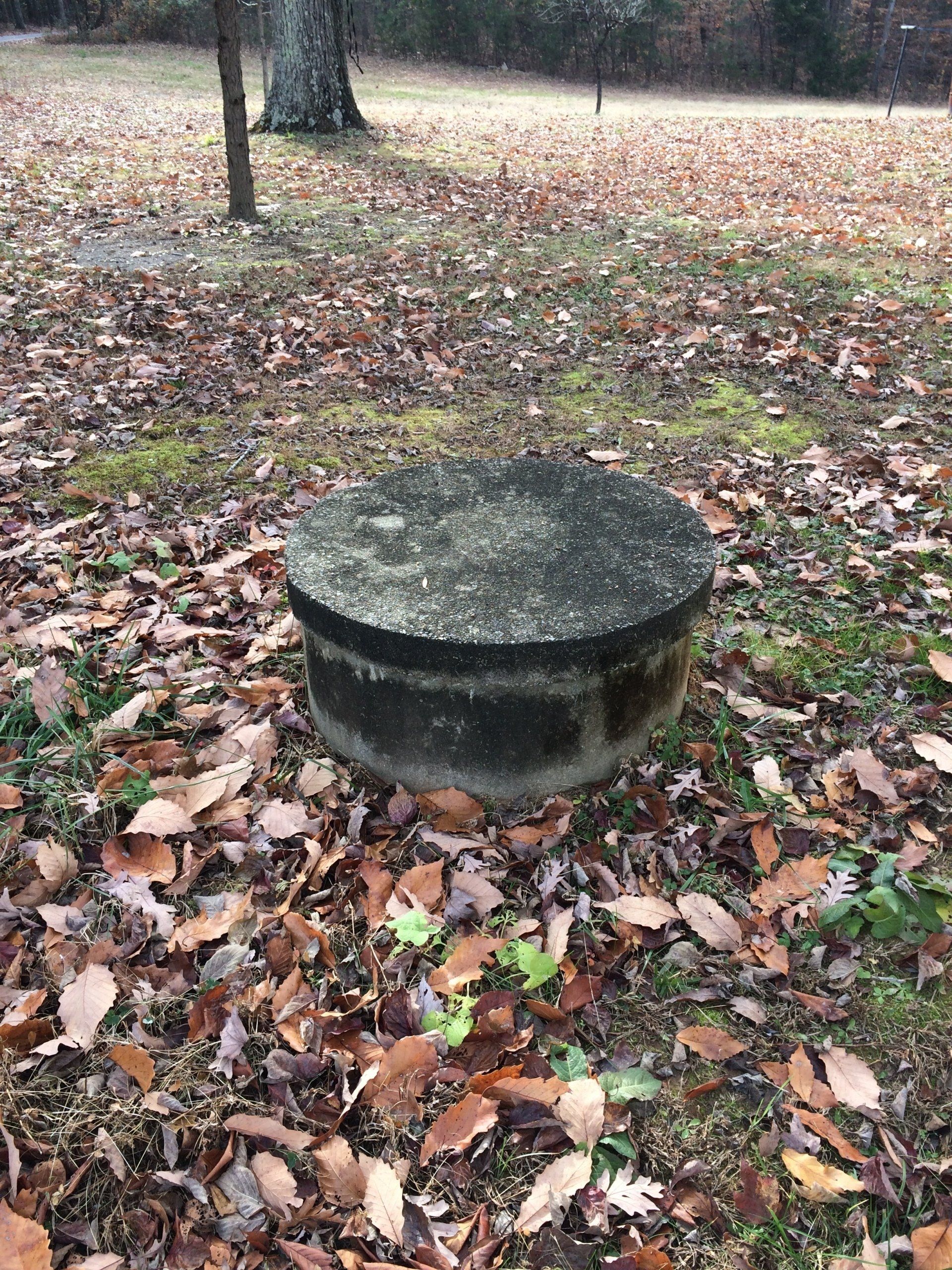 old dirty concrete chair at the park