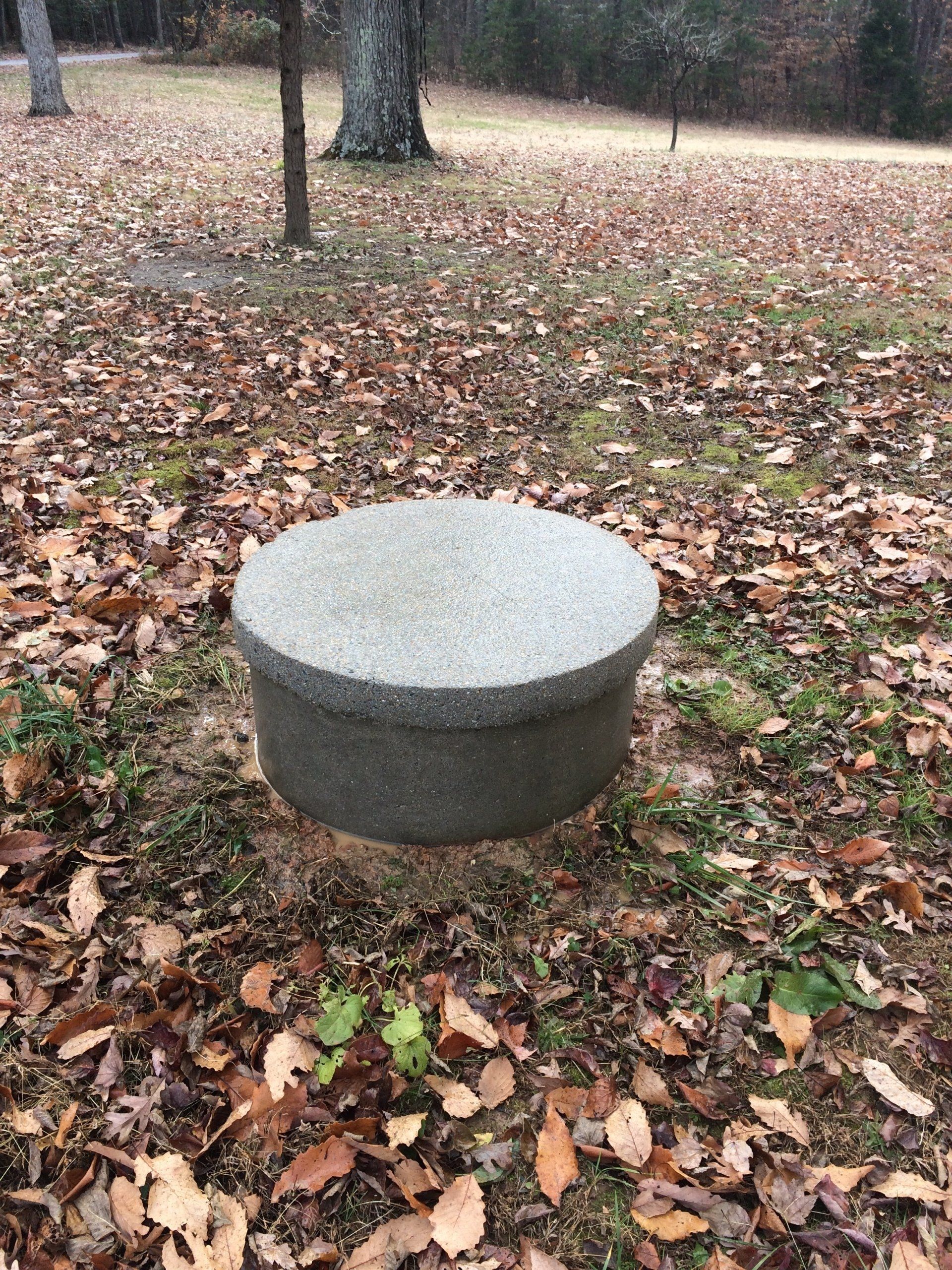 cleaned new look concrete chair at the park