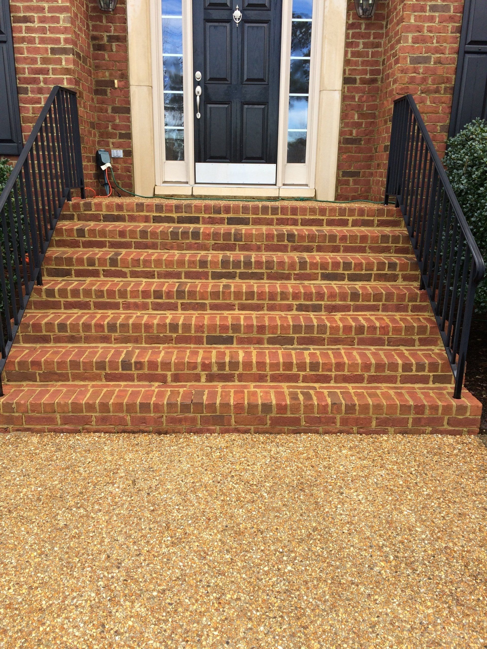 cleaned new look concrete stairs in front house