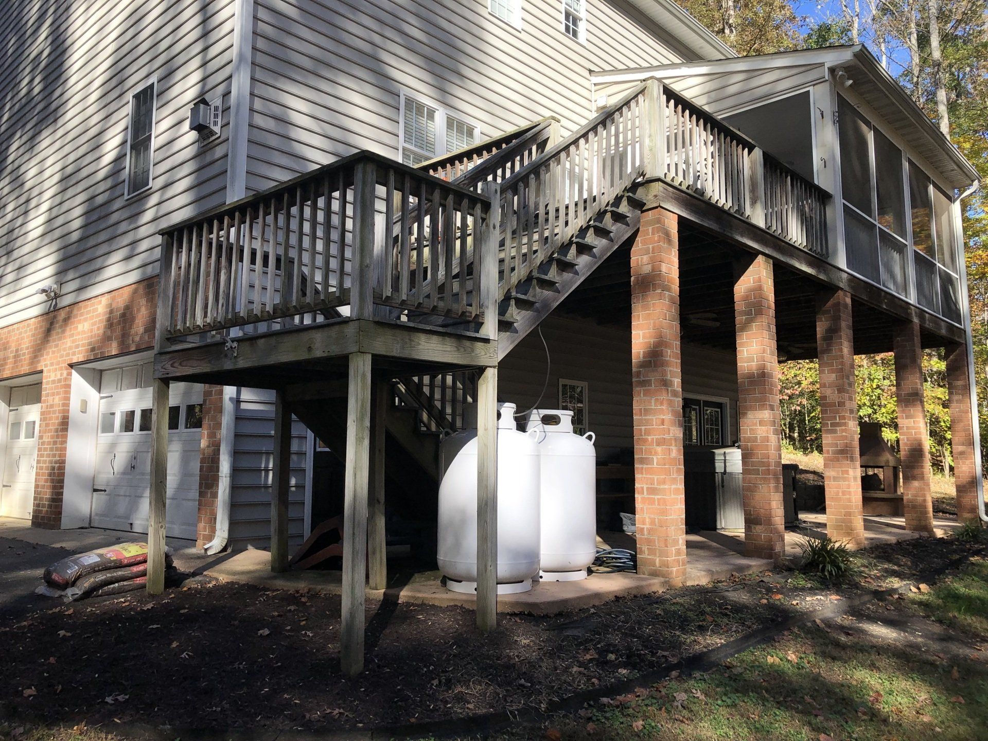 dirty old wood balcony, house and stairs