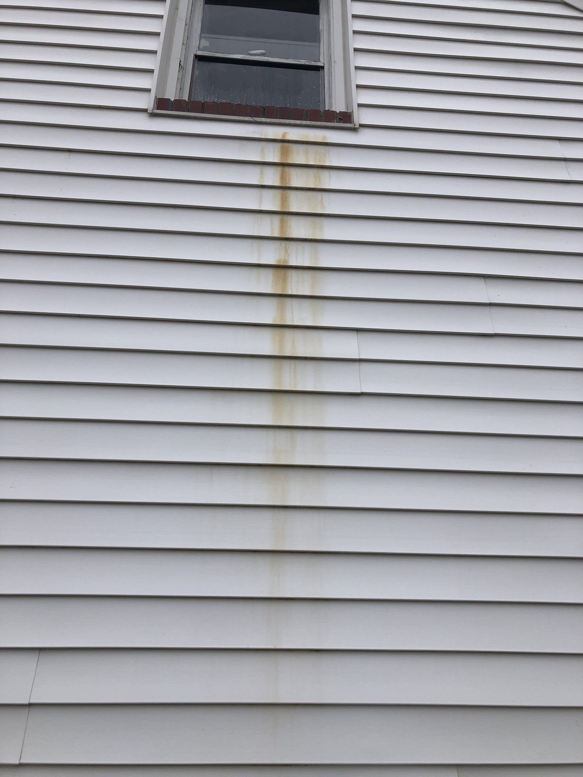 old rusty exterior of the house on window