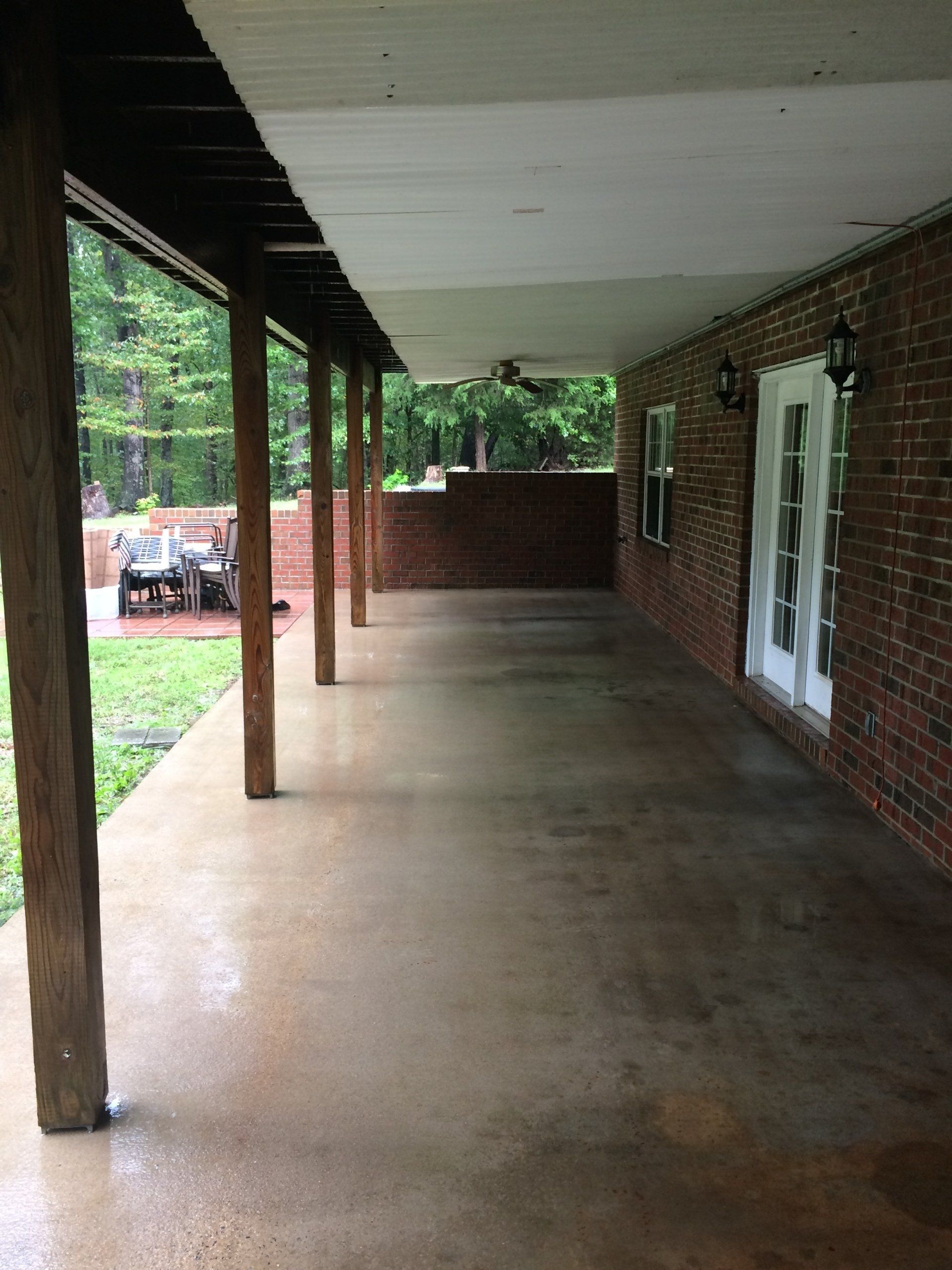 cleaned new look concrete floor without algae after