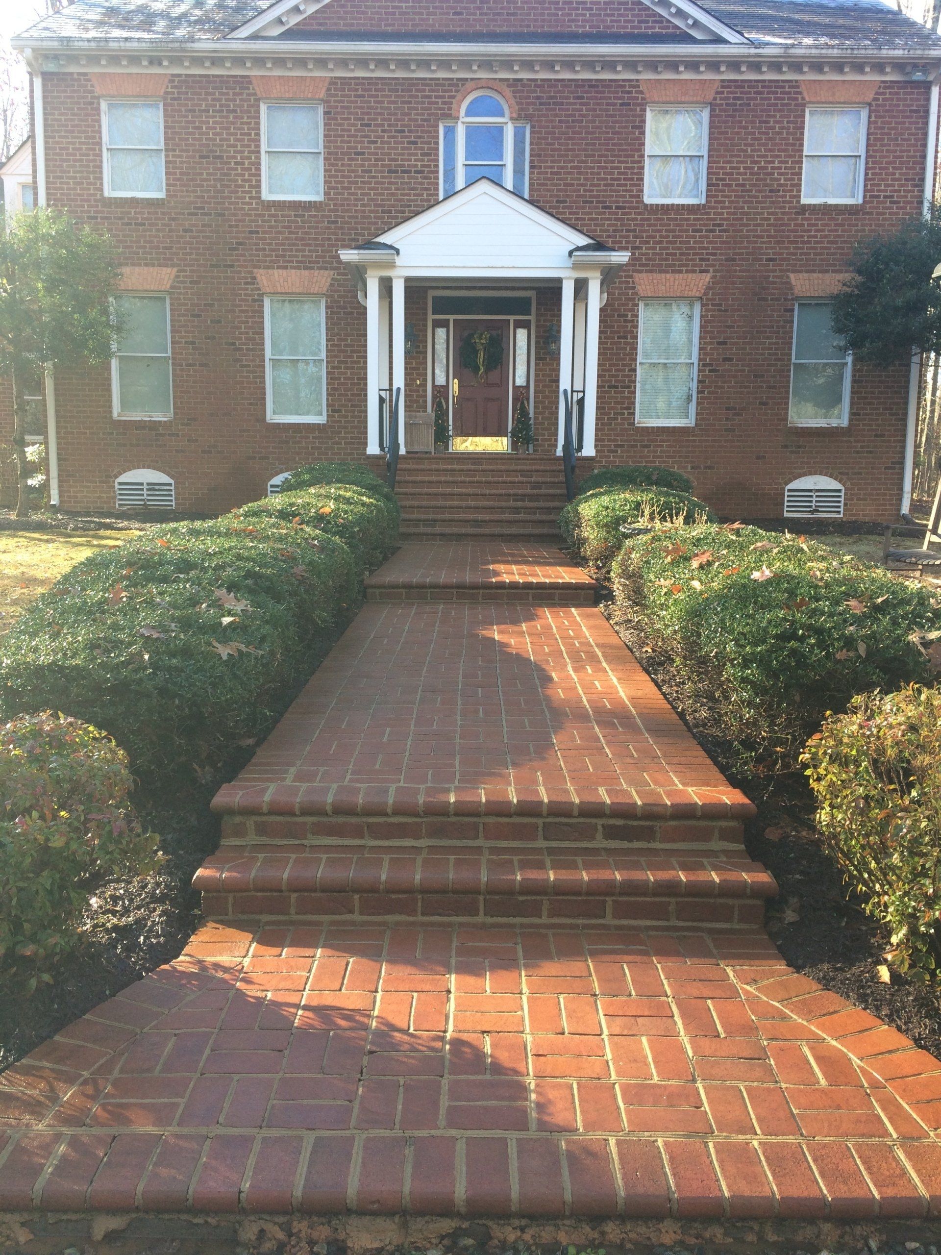 cleaned new look concrete path way to house