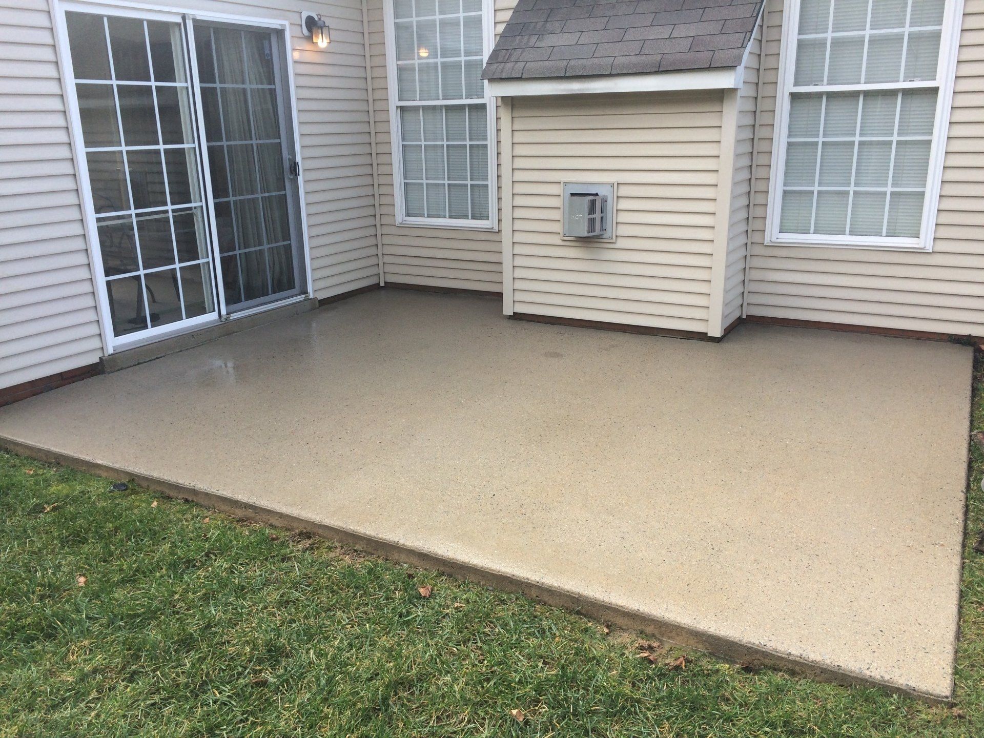 cleaned new look concrete floor with white house