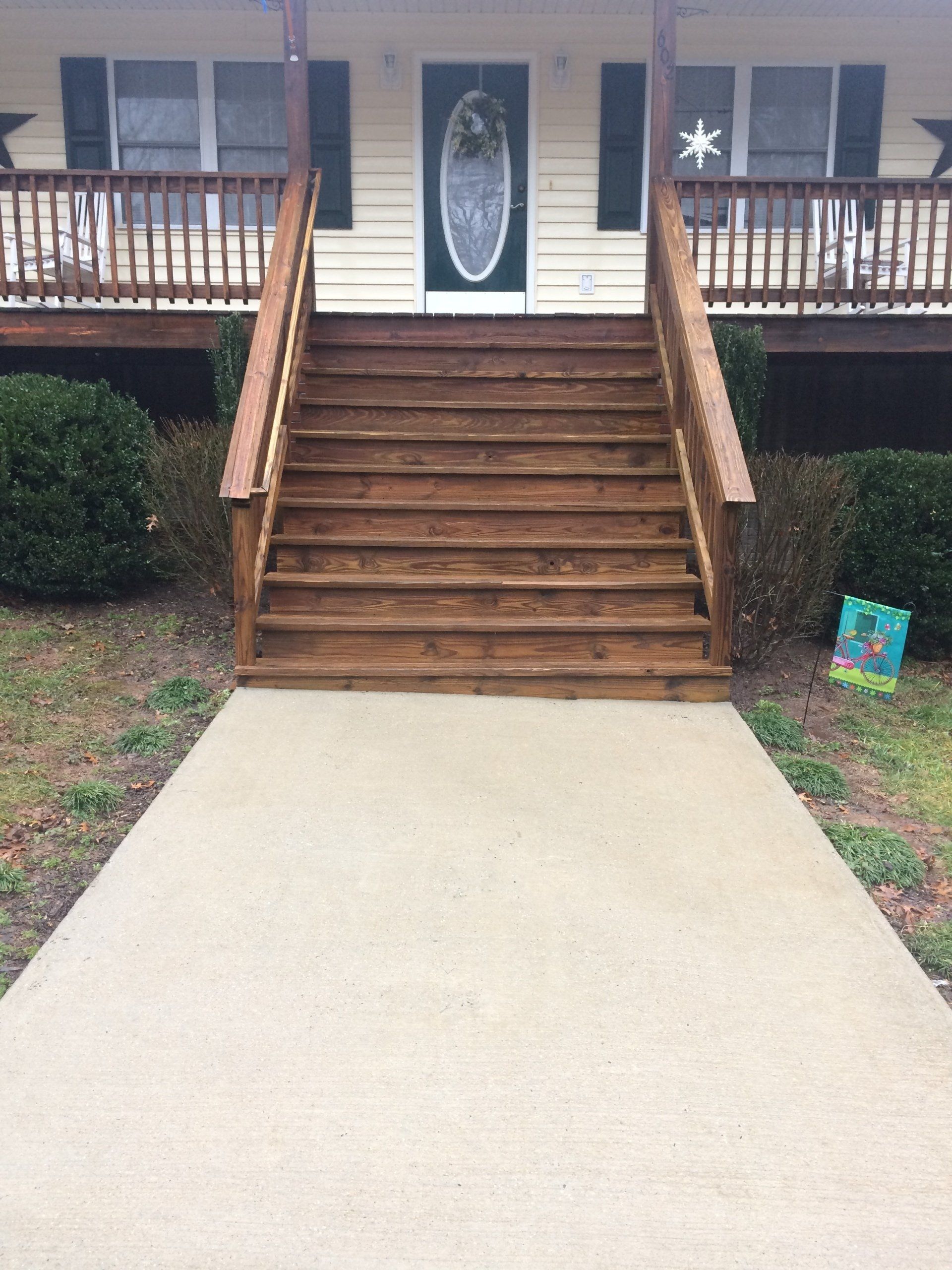 cleaned new look concrete floor with wooden stairs